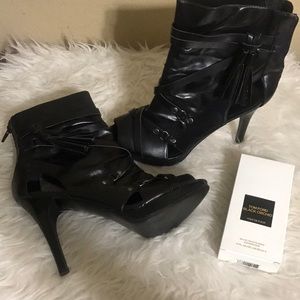 Carlos Santana black heels